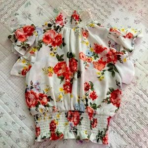 High collar crop style blouse with floral prints